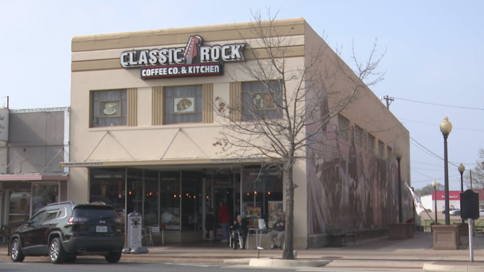 The outside of Classic Rock Coffee Co. & Bakery in downtown Navasota where a mural honoring...
