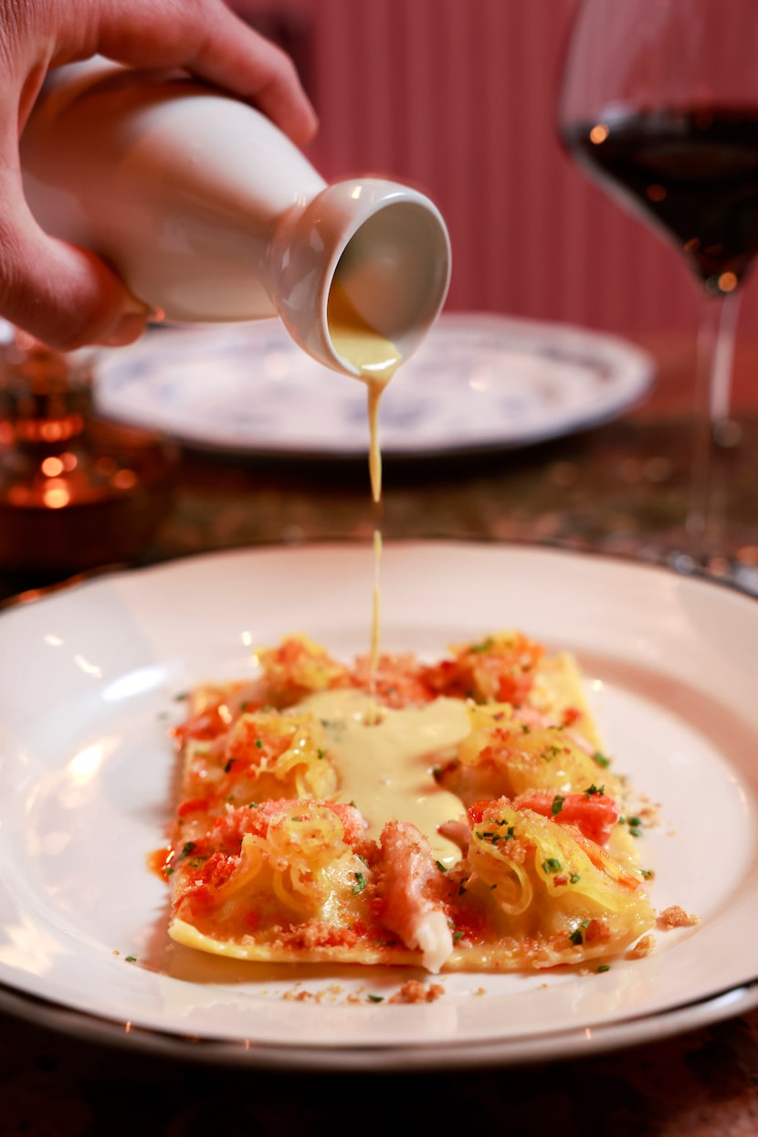 Vadouvan cream is poured over the "snow crab 6-pack" at The Charles in Dallas.