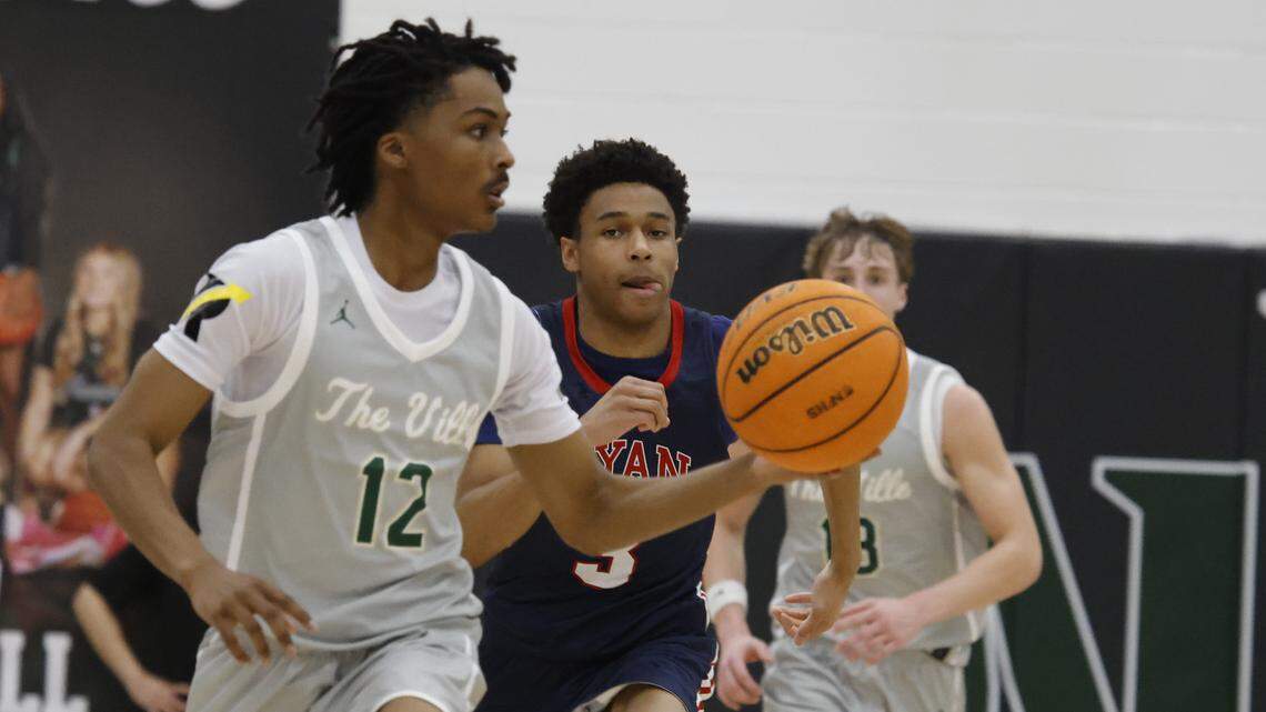 Birdville guard Brenden Williams (12) brings the ball down court in front of Denton Ryan guard Brayden McDade (3) during the second half of a UIL basketball game at Birdville High School in North Richland Hills, Texas, Tuesday Feb. 17, 2026.