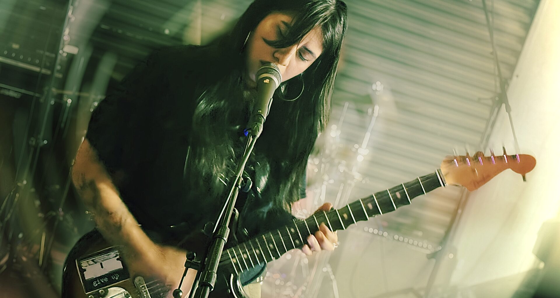 Nikki Perez of Houston's Daze captivates the crowd with her powerful vocals and shoegaze sound.
