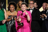 Kelly Clarkson, center, and the team from "The Kelly Clarkson Show" accept the award for...