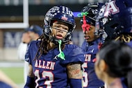 Allen’s LeBron Bauer talks with teammates during the second half of the Class 6A Division I...