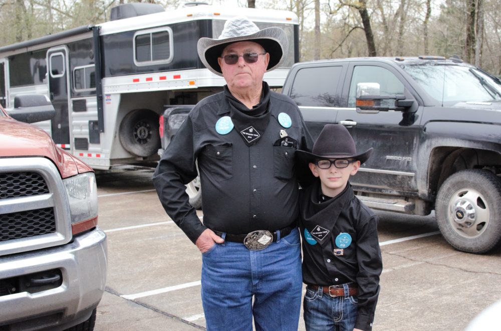 Spanish Trail Ride's Trail Boss, Joe Cantrell, with his great-grandson, Clay Yates.