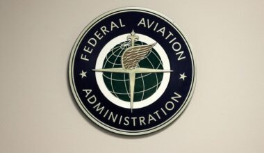 A Federal Aviation Administration sign hangs in the tower at John F. Kennedy International Airport in New York, March 16, 2017. (AP Photo/Seth Wenig, File)