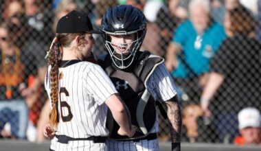 Aledo pitcher Tempe Perry (16) and catcher Austyn Marriage (4) discuss the situation during the UIL softball state semifinals 5A D1 playoff game at Trojan Softball Field in Euless, Texas, Wednesday, May 21, 2025.