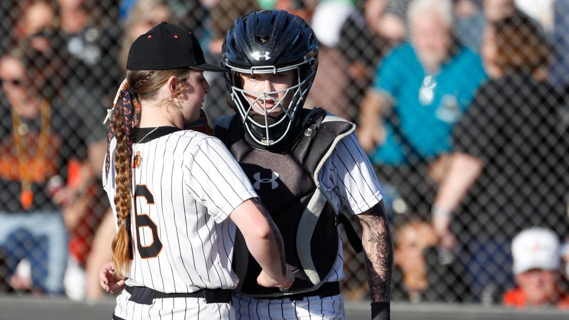 Aledo pitcher Tempe Perry (16) and catcher Austyn Marriage (4) discuss the situation during the UIL softball state semifinals 5A D1 playoff game at Trojan Softball Field in Euless, Texas, Wednesday, May 21, 2025.