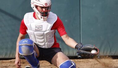 Grapevine catcher Gianni Corral picks one out of the dirt in the pitching cage during Grapevine Mustang baseball practice at Grapevine High School in Grapevine, Texas, Tuesday Feb. 17, 2026.