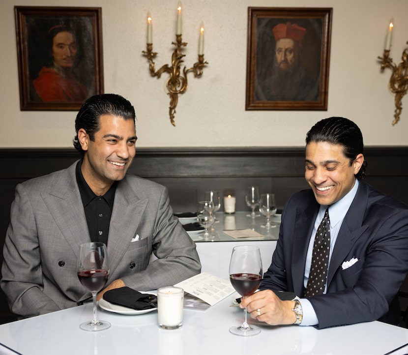 (From left) Brothers Pasha and Sina Heidari pose for a photo in a dining area of Urbano...