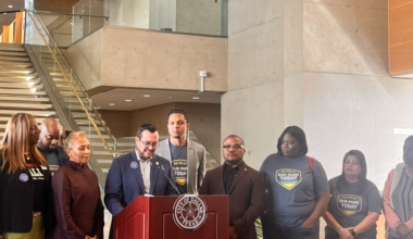 Adam Bazaldua is joined by South Dallas residents and State Rep. Venton Jones.