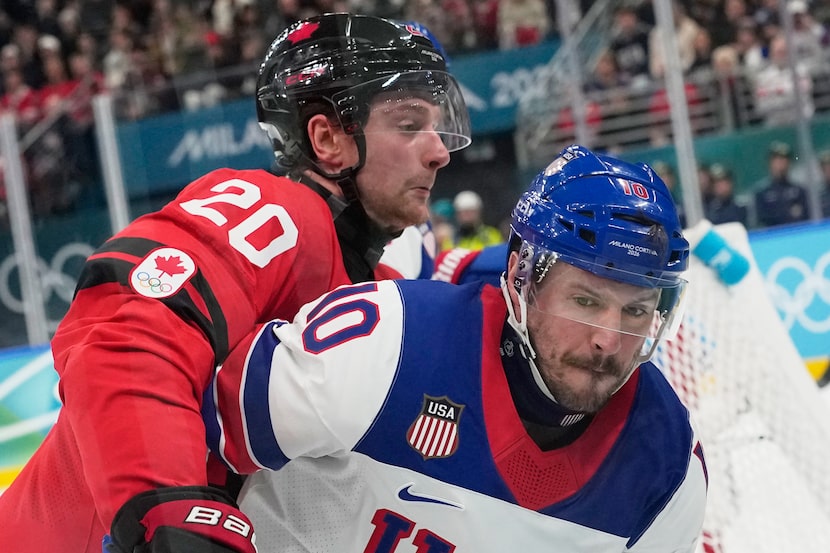 Canada's Thomas Harley (20) and United States' JT Miller (10) during a men's ice hockey gold...