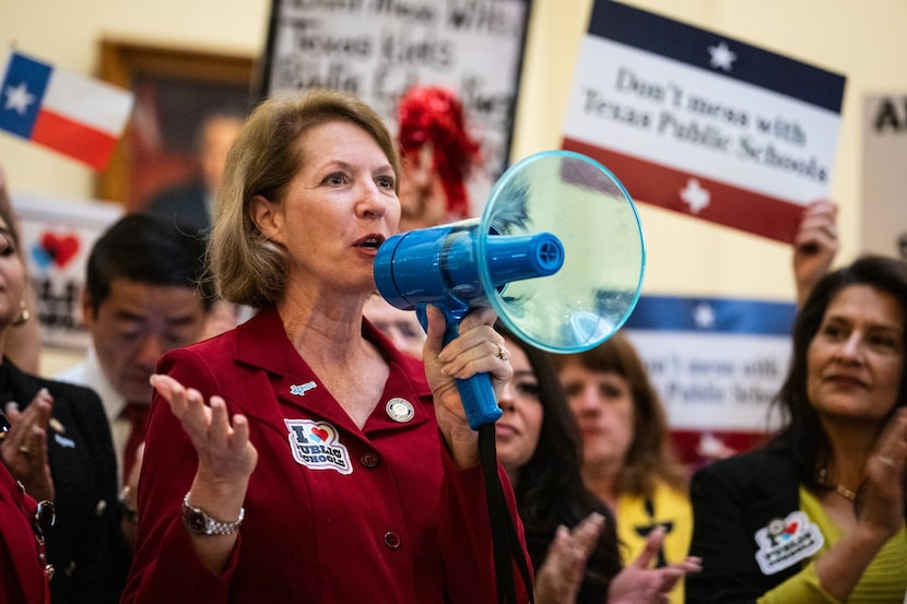 Texas Rep. Vikki Goodwin, D-Austin, speaks to protesters in the Capitol Rotunda during a...