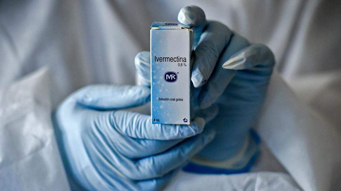 A health worker shows a box containing a bottle of Ivermectin, a medicine authorized by the National Institute for Food and Drug Surveillance (INVIMA) to treat patients with mild, asymptomatic or suspicious COVID-19, as part of a study of the Center for Paediatric Infectious Diseases Studies, in Cali, Colombia, on July 21, 2020. (Photo by Luis ROBAYO / AFP) (Photo by LUIS ROBAYO/AFP via Getty Images)