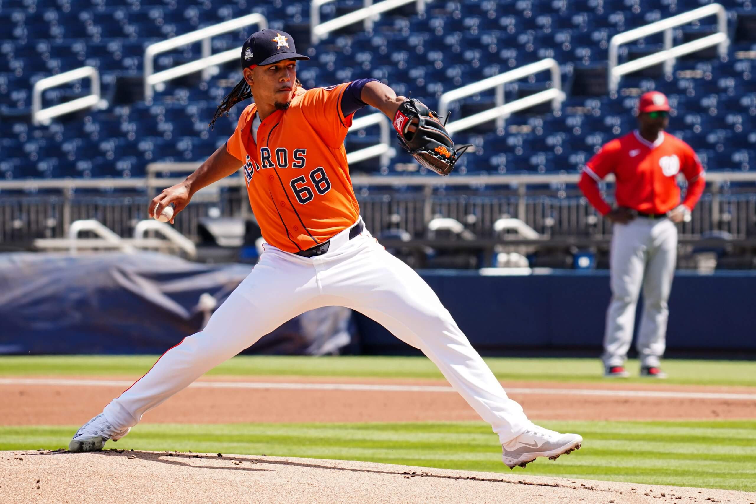 Miguel Ullola #68 of the Houston Astros pitches during the game between the Washington Nationals and the Houston Astros at Cacti Park at the Palm Beaches on Friday, March 14, 2025 in West Palm Beach, Florida. 