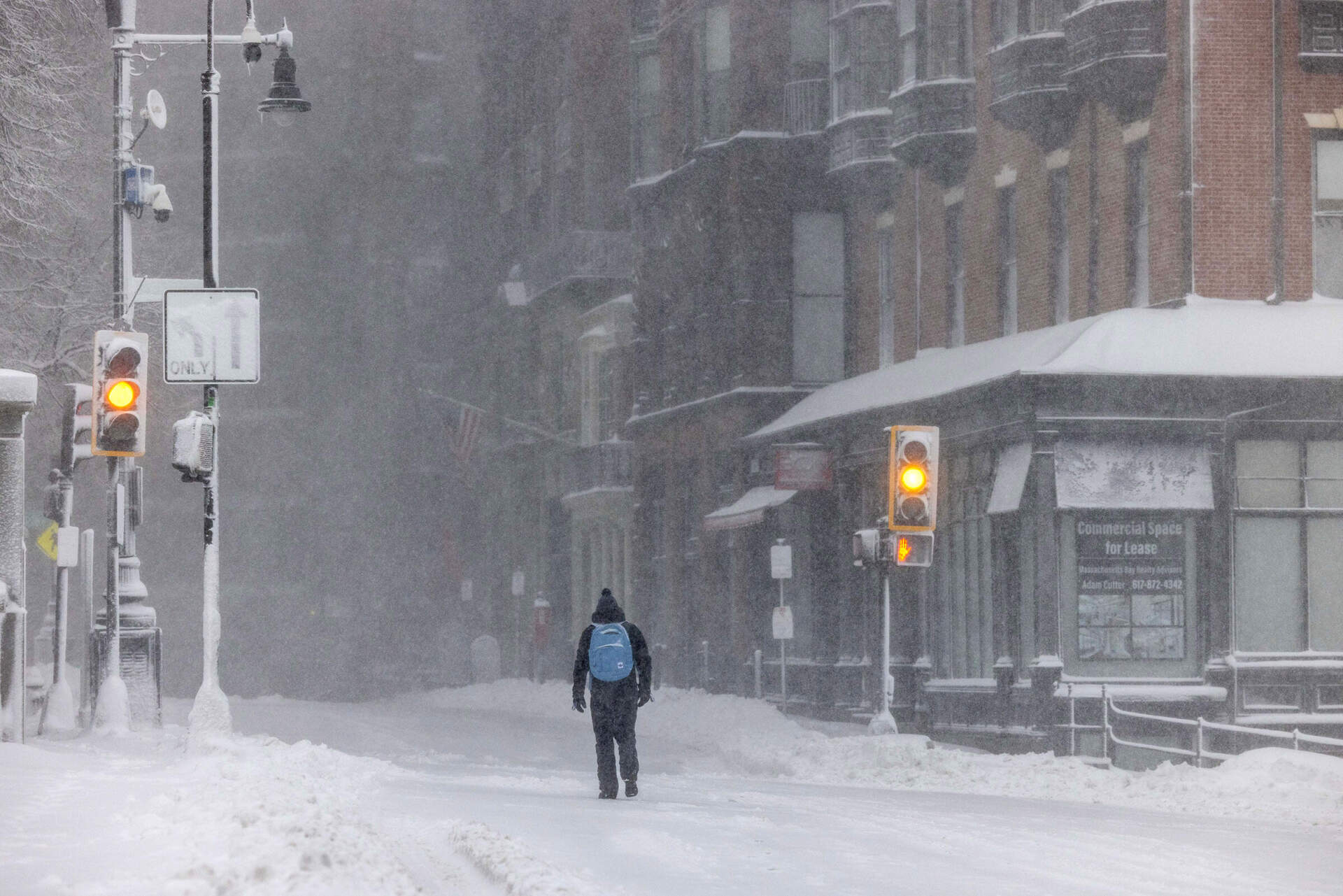 A person walks down Beacon Street on Monday in Boston. (Scott Eisen/Getty Images)