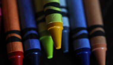 Crayons against a black background
