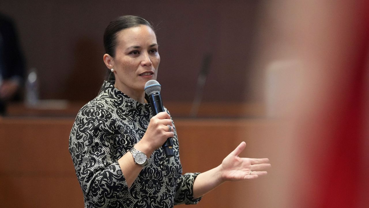 San Antonio Mayor Gina Ortiz Jones speaks to applicants from 20 countries as they prepare to take an oath of citizenship in commemoration of Independence Day during a Naturalization Ceremony in San Antonio, Thursday, July 3, 2025. (AP Photo/Eric Gay)