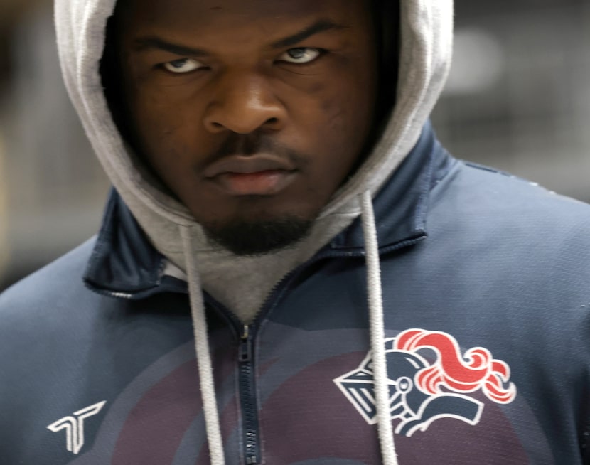 Dallas Kimball wrestler Quintraylon Johnson exhibits a determined focus prior to his match...