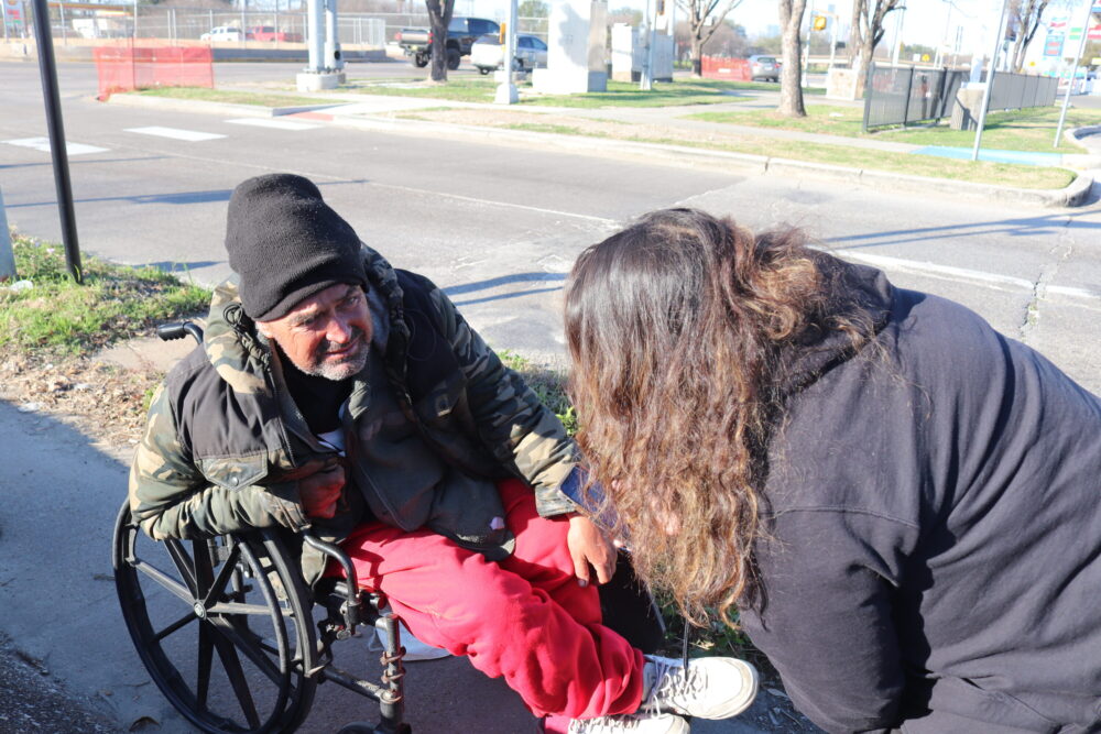 Timothy Wright responds to a survey conducted by Jackie Urbina, an outreach associate with the Coalition for the Homeless, on Feb. 24, 2026.