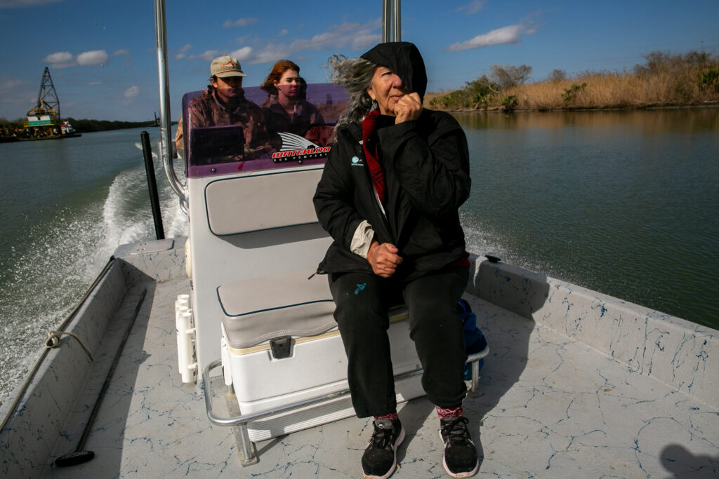 Diane Wilson with her 17-year-old boat captain, Rusty, on the Victoria Barge Canal on Feb. 1. Credit: Dylan Baddour/Inside Climate News