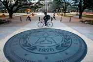 Texas A&M students commute on the Texas A&M University campus in College Station on Jan. 31,...