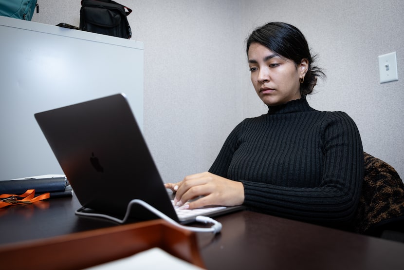 Kamila Vargas-Gonzalez worked on a social media post for a community resource fair at the...