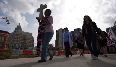 Immigration advocates protest recent detentions by ICE outside the immigration court in San Antonio, Texas, Tuesday, July 1, 2025. (AP Photo/Eric Gay)