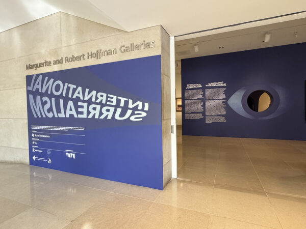 A photograph of the entry of the exhibition “International Surrealism” on view at the Dallas Museum of Art.