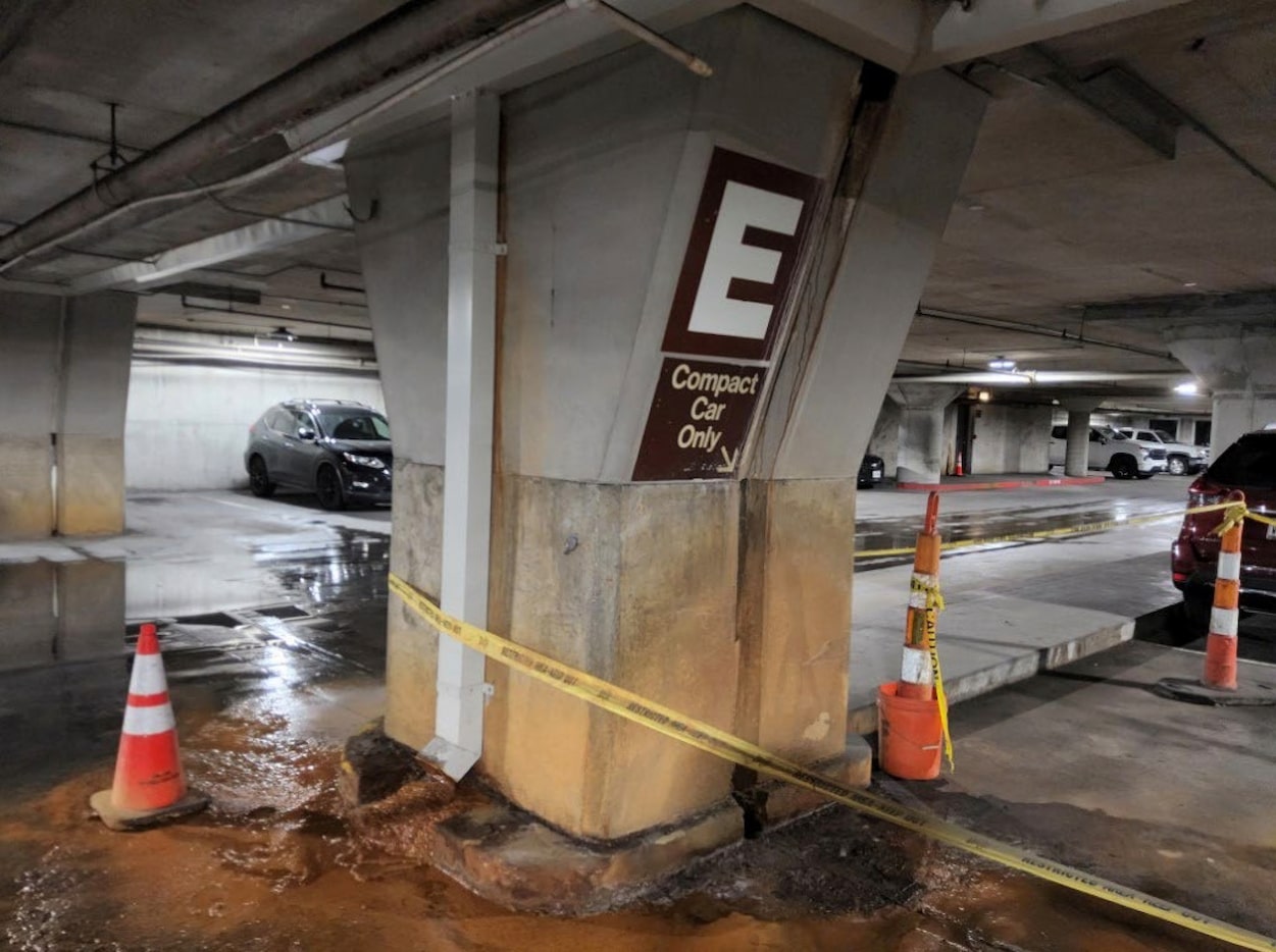 This image, featured in the Dallas City Hall Analysis Report,  shows water intrusion managed...