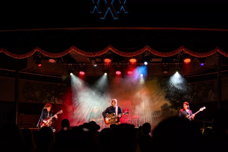 A band performs during the 2023 opening of Stable Hall. The venue debuted with a splash, but faced early hurdles including a legal dispute with its initial partners.
