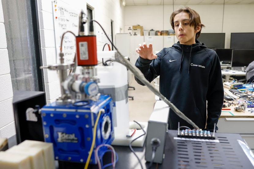 13-year-old Aidan McMillan talks about his nuclear fusor at Launchpad Incubator on Friday,...