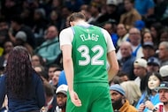 Dallas Mavericks forward Cooper Flagg leaves the court during the second half of an NBA...