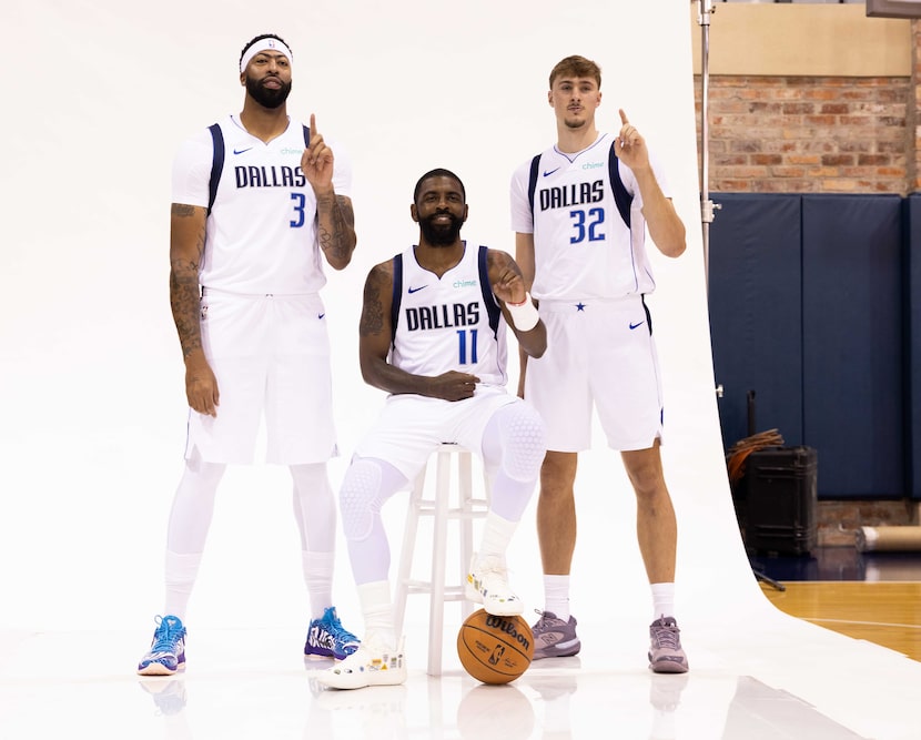 Dallas Mavericks forward Anthony Davis (3), Dallas Mavericks guard Kyrie Irving (11) and...