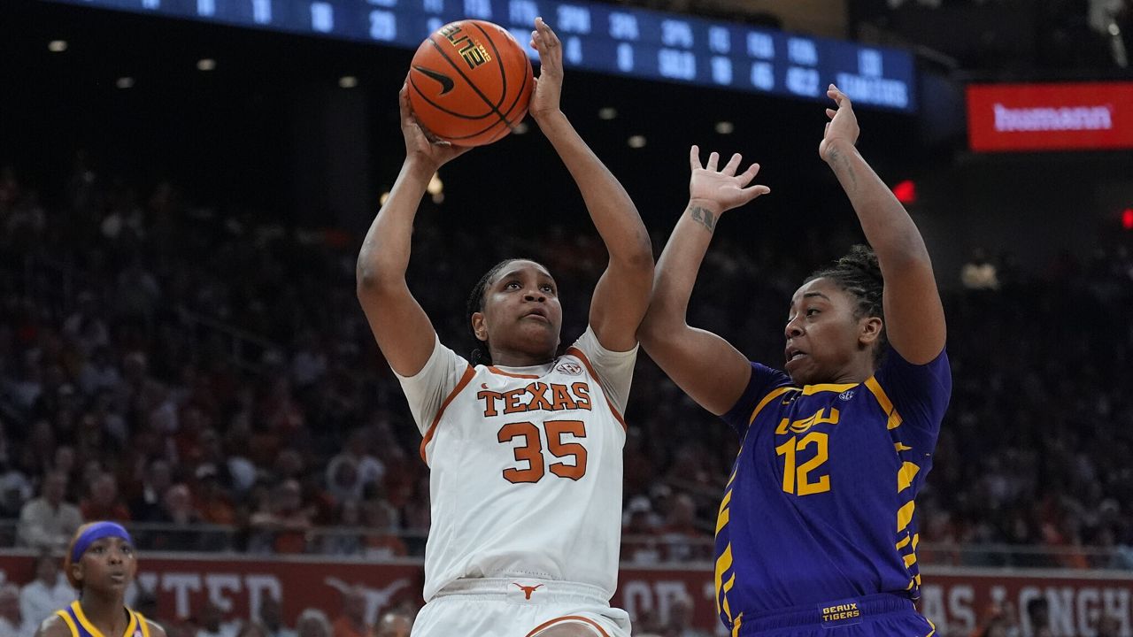 Texas forward Madison Booker (35) shoots against LSU guard Mikaylah Williams (12) during the second half of an NCAA college basketball game in Austin, Texas, Thursday, Feb. 5, 2026. (AP Photo/Eric Gay)