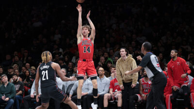 Jan 16, 2026; Brooklyn, New York, USA; Chicago Bulls forward Matas Buzelis (14) shoots the ball as Brooklyn Nets forward Noah Clowney (21) defends during the second half at Barclays Center.