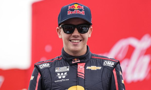NASCAR driver Connor Zilisch smiles prior to the May 25, 2025 race at Charlotte Motor Speedway in Concord, N.C. (AP Photo/Matt Kelley, file)
