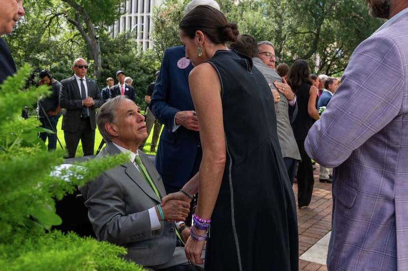 Cici Williams Steward, mother of 8-year-old flood victim Cile Steward, meets with Gov. Greg...