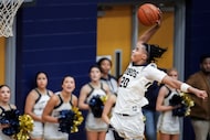 Little Elm's Kensington Candler (20) goes up for a dunk during a District 5-6A boys high...