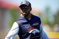 Denver Broncos defensive back coach Christian Parker during the NFL football team's training...
