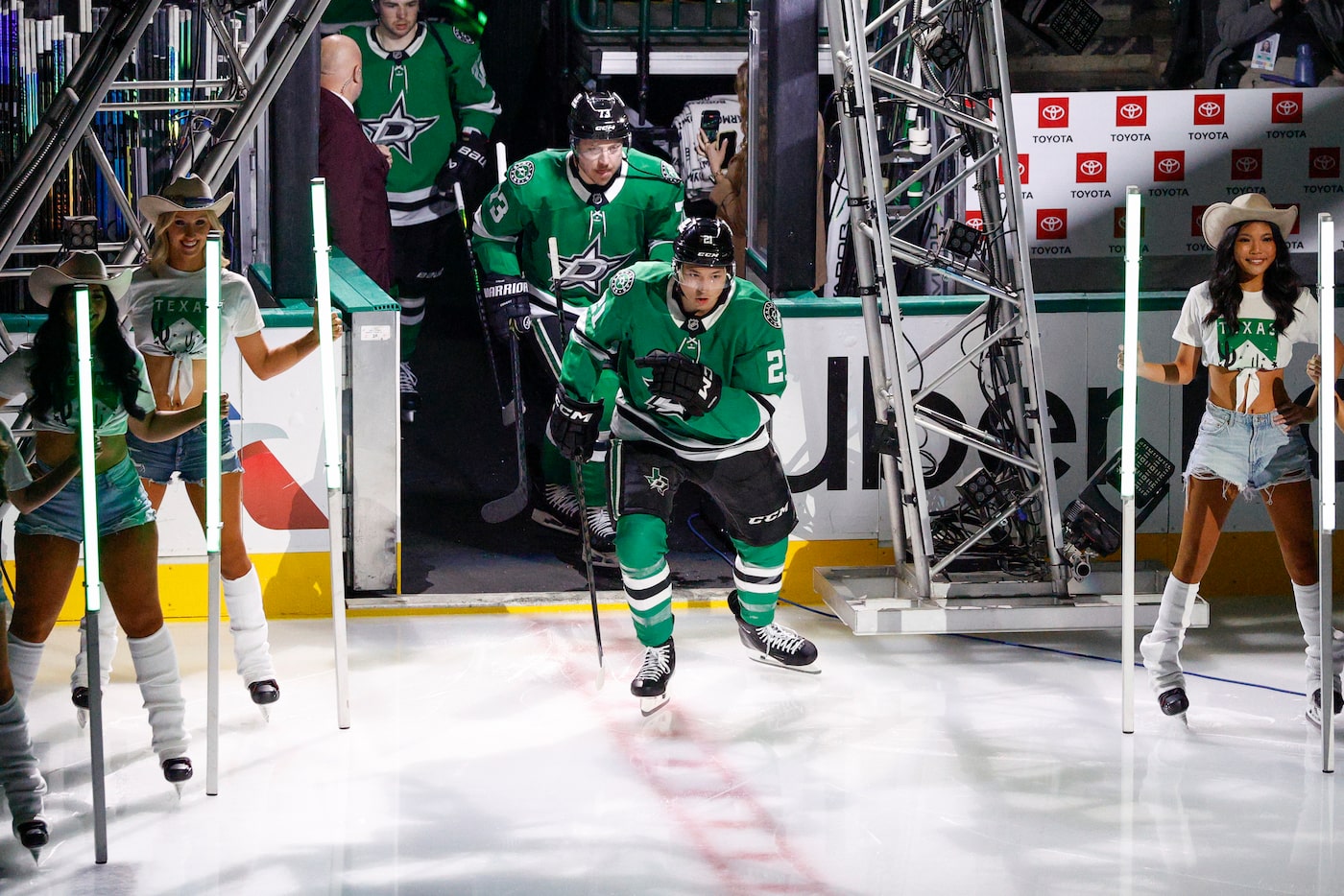 Dallas Stars left wing Jason Robertson (21) leads the team onto the ice before the first...