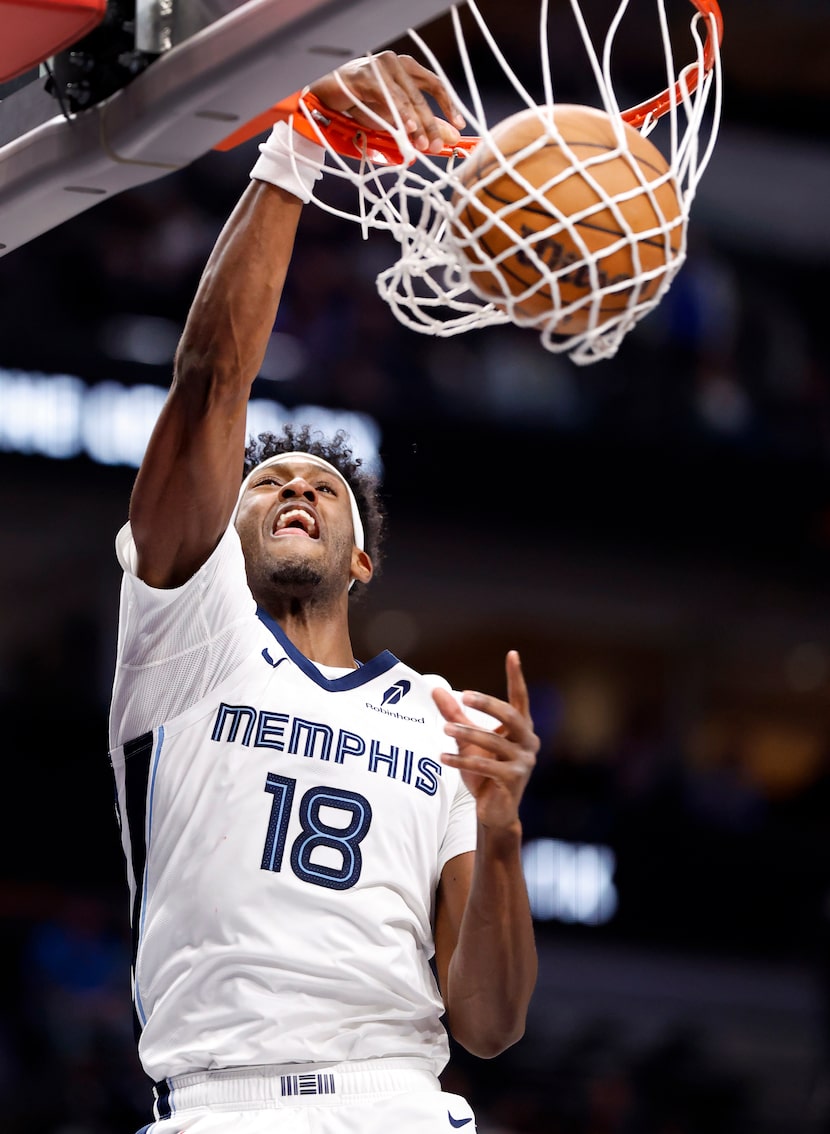 Memphis Grizzlies forward Olivier-Maxence Prosper (18) throws down a second half dunk...
