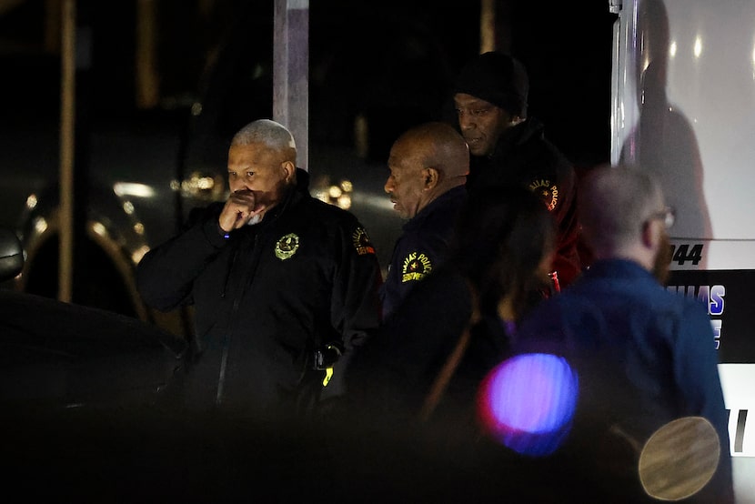 Police Chief Daniel Comeaux (left) is seen at a scene in the 4300 block of Woodhollow Drive...