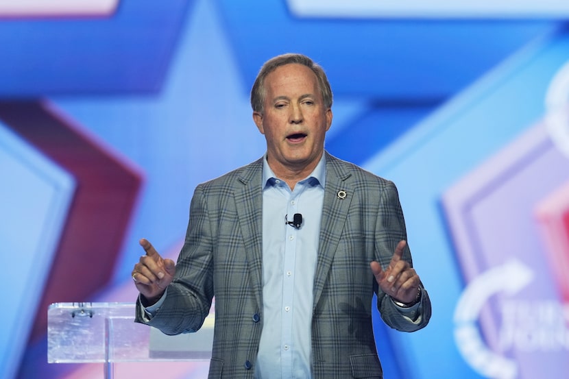 Texas Attorney General Ken Paxton speaks during Turning Point USA's AmericaFest 2025,...
