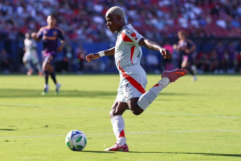 FC Dallas forward Bernard Kamungo shoots during the second half of an MLS game against the...