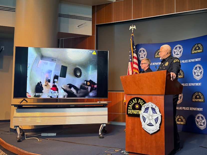 Dallas police Chief Daniel Comeaux watches edited body-worn camera footage of a Red...
