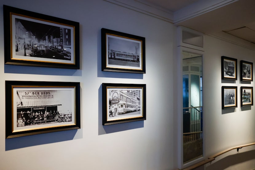 Historic photos of Dallas are seen in a hallway at the Kimpton Pittman Hotel, Wednesday,...