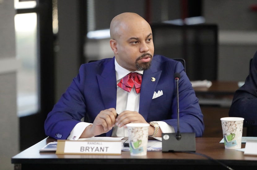 DART Board Chairman Randall Bryant listens to a speaker as the Regional Transportation...