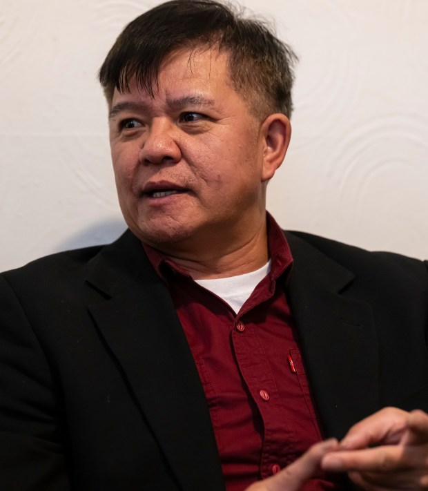 Wa Chi Minh Vang talks about his sister, Thi Dua Vang, with journalists