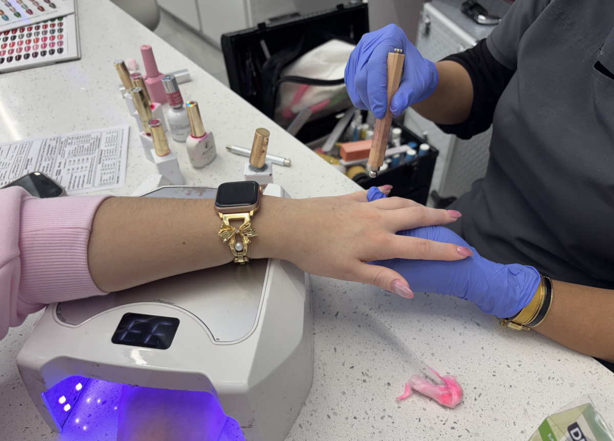A TCU student gets her nails done at Onyx Nail Bar.
