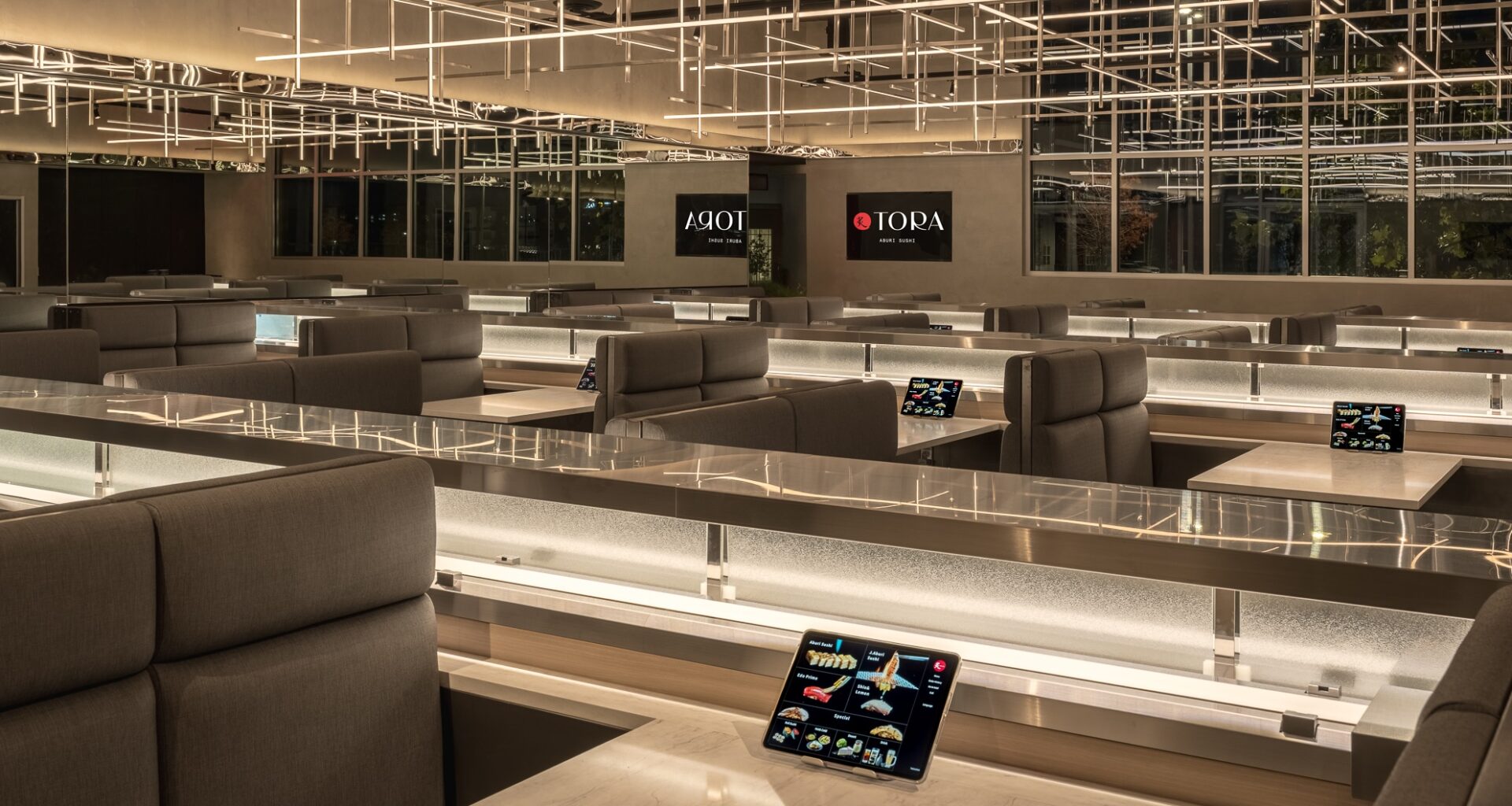 This Tech-Forward Austin Spot Delivers Sushi on a Robotic Laneway