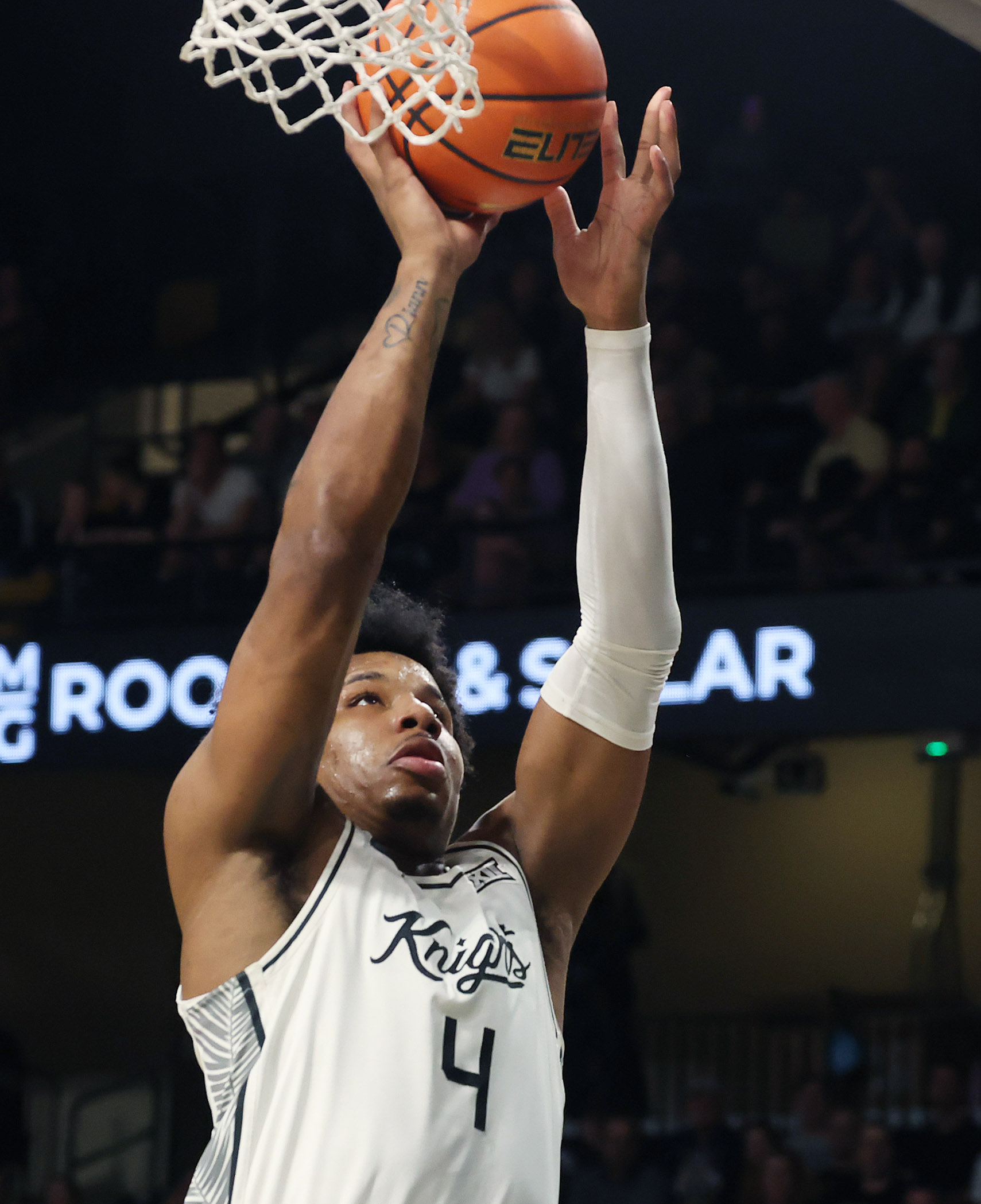 UCF forward Jamichael Stillwell scores during the TCU at UCF...